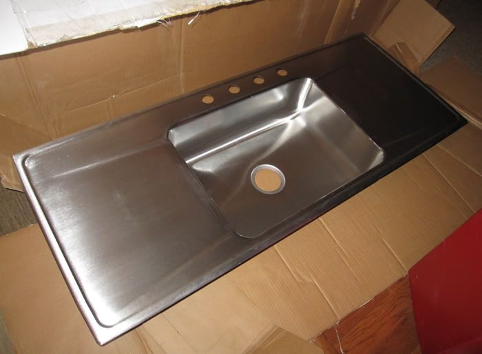 my new SS sink has a dented lip fixable??