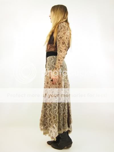   High waistline. Dramatic skirt. Additional lace details dress in all