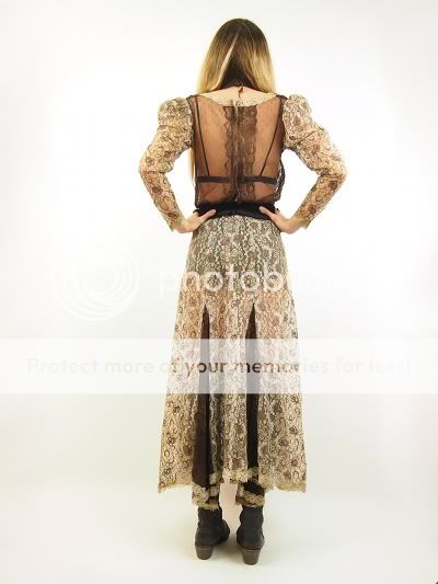   High waistline. Dramatic skirt. Additional lace details dress in all